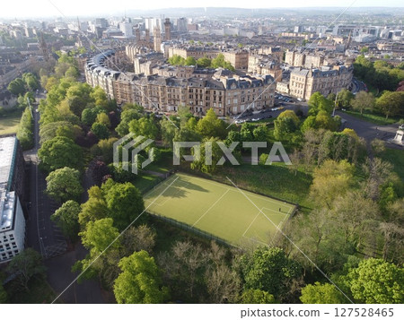 Glasgow is Scotland largest city in the UK, featuring historic, artistic charm with beautiful Victorian architecture and the Clyde River. 127528465