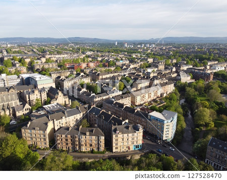 Glasgow is Scotland largest city in the UK, featuring historic, artistic charm with beautiful Victorian architecture and the Clyde River. 127528470
