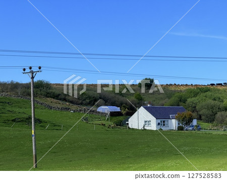 Islay island is located off Scotland west coast renowned for whisky distilleries and birdwatching. Numerous distilleries and diverse migratory birds make it a captivating destination. Islay island is located off Scotland west coast renowned for whisky distilleries and birdwatching. Numerous distilleries and diverse migratory birds make it a captivating destination. 127528583