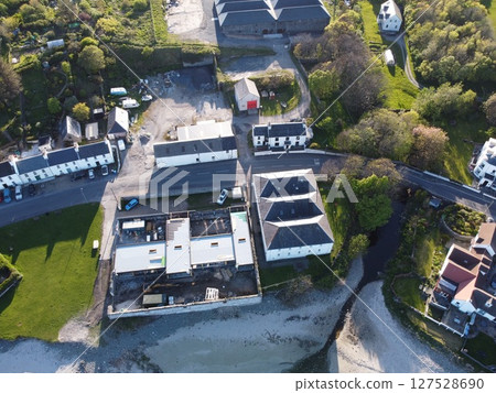 Port Charlotte is a town on the west coast of Islay, Scotland. Whisky distilleries and hotels dot the area, with scenic shorelines and historic charm. 127528690