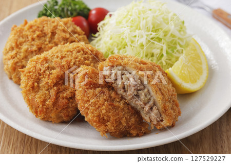 Delicious looking minced meat cutlet 127529227