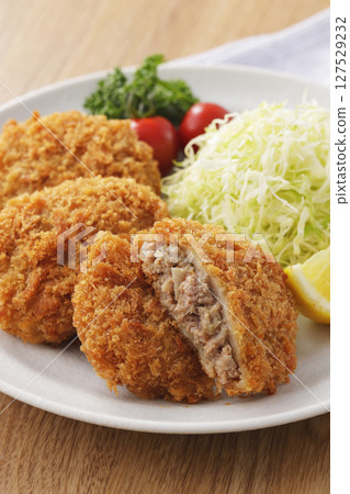 Delicious looking minced meat cutlet 127529232