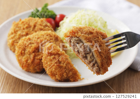 Delicious looking minced meat cutlet Delicious looking minced meat cutlet 127529241