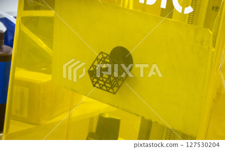 Object printed on 3D printer from rubber on working surface of 3D printer. Model created on 3D printer from hardened rubber under influence of ultraviolet light. SLA 3D printing. Stereolithography 127530204