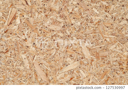 Chipboard plywood yellow close-up, uniform texture background  127530997