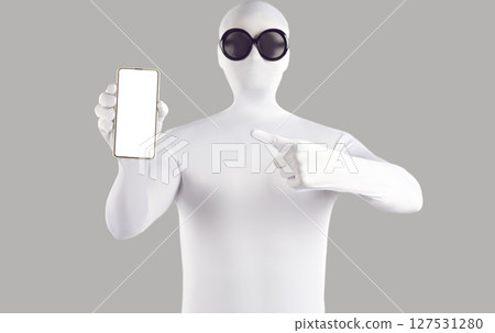 Faceless person in white spandex costume holding smartphone with white blank screen for mockup. 127531280