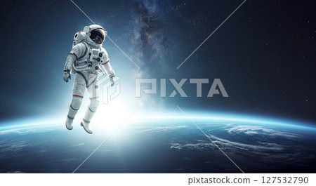 An astronaut floats through the cosmos, an awe-inspiring vision of exploration 127532790