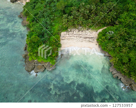 Drone view of clear water on beach in Carabao Island. San Jose, Romblon. Philippines. Drone view of clear water on beach in Carabao Island. San Jose, Romblon. Philippines. 127533957