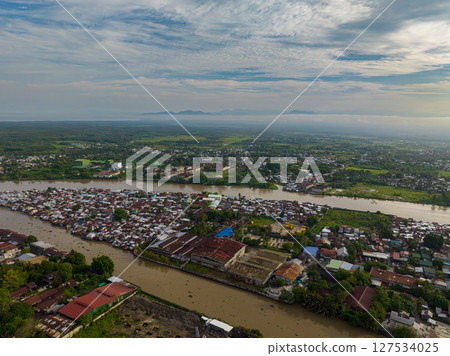 Cotabato City with river, the independent city in Mindanao, Philippines. Cotabato City with river, the independent city in Mindanao, Philippines. 127534025