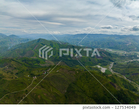 Green forest in the mountains and jungle hills in the highlands. Mindanao, Philippines. 127534049