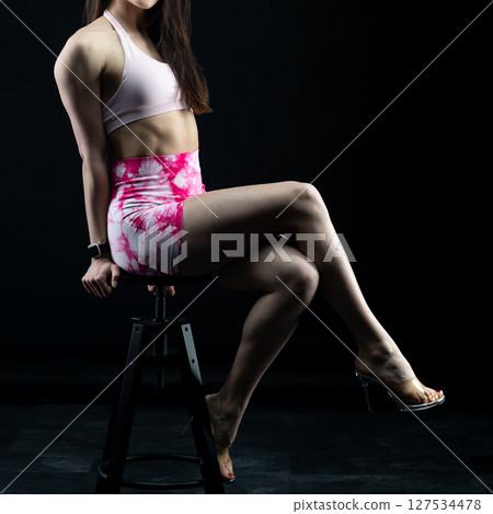 athletic female body on dark background, fitness woman, athletic girl torso athletic female body on dark background, fitness woman, athletic girl torso 127534478