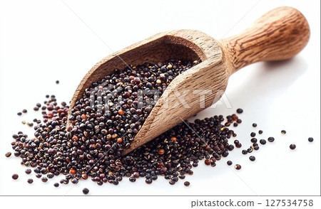 Black quinoa seeds in wooden scoop isolated on white background with clipping path 127534758