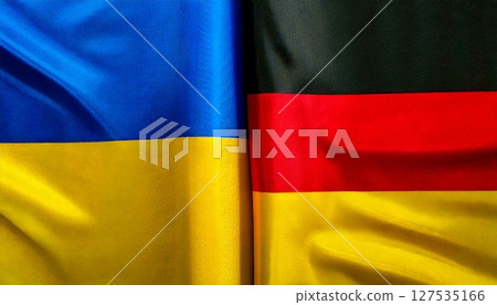 Germany and Ukraine flags. 127535166