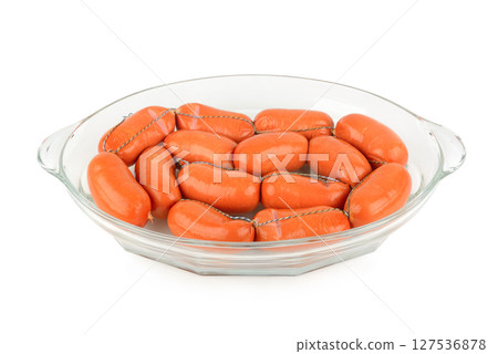 Meat sausages isolated on white. 127536878