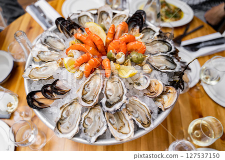 Seafood Platter with Oysters, Shrimp, Mussels, and Lemon Seafood Platter with Oysters, Shrimp, Mussels, and Lemon 127537150