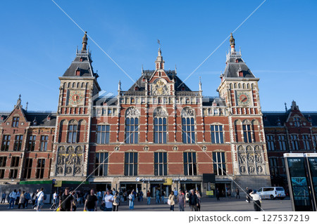 Amsterdam Central Station on a clear day/Netherlands Amsterdam Central Station on a clear day/Netherlands 127537219