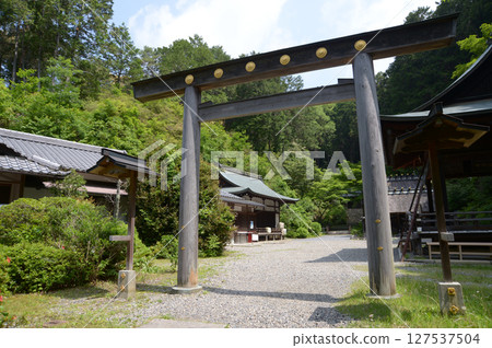The torii gate at the entrance to the grounds of Hyuga Daijingu Shrine, Hinooka, Yamashina Ward, Kyoto City 127537504