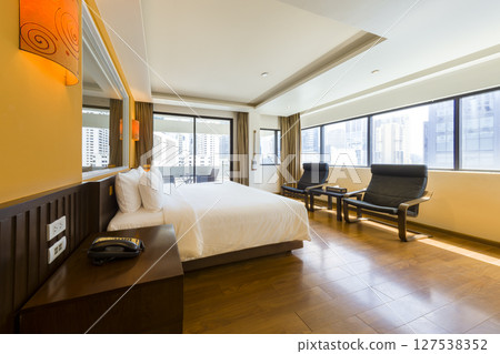 Hotel room overlooking the skyscrapers in downtown Bangkok, Thailand 127538352