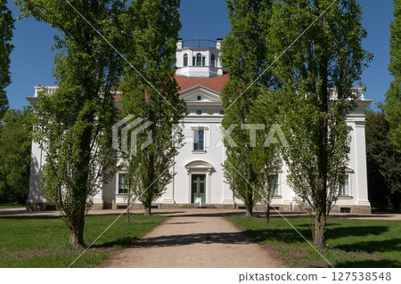 Classic building in the park in spring. 127538548