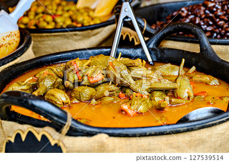 Container with fresh and delicious eggplants. Container with fresh and delicious eggplants. 127539514