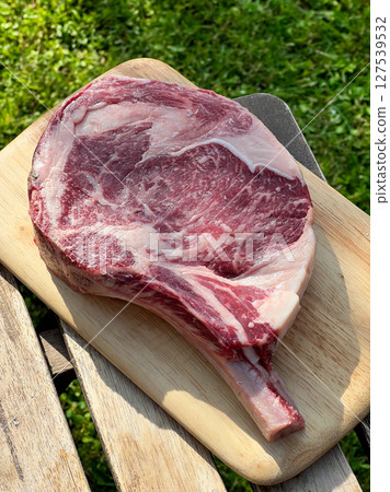 raw bio steak with bone 127539532