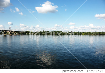 View of the railway bridge over the Dnieper River in the city of Dnieper, Ukraine. 127539739