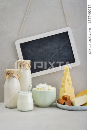 Various dairy products with framed chalk board Various dairy products with framed chalk board 127540013