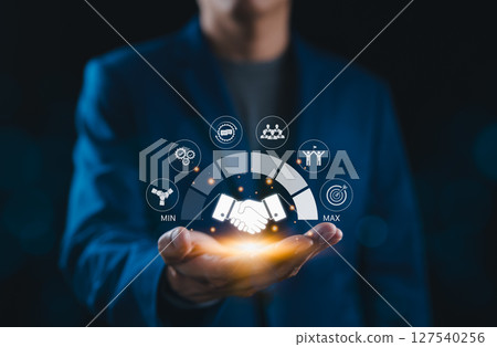 Business Collaboration and Performance Optimization Concept. Businessman presents handshake and teamwork icons, symbolizing collaboration, efficiency, and performance optimization. Trusted Partner, Business Collaboration and Performance Optimization Concept. Businessman presents handshake and teamwork icons, symbolizing collaboration, efficiency, and performance optimization. Trusted Partner, 127540256