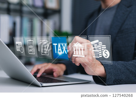 Tax Planning and Financial Compliance Concept. Businessman using laptop with icons related to tax, finance, checklist, government, calendar, calculation, accounting, and tax planning. Income taxation, 127540268