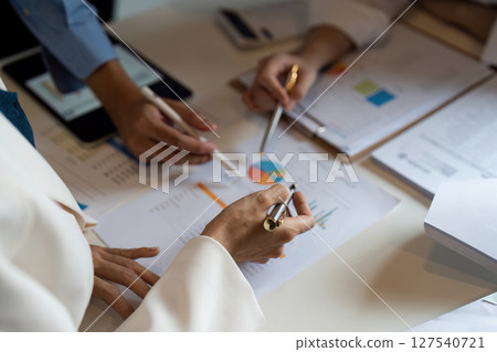 Business team collaboration discussing working with new projects, discussion and analysis and brainstorming to strategy planning making a profit of the company Business team collaboration discussing working with new projects, discussion and analysis and brainstorming to strategy planning making a profit of the company 127540721