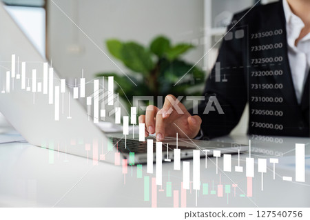 Business woman use laptop and tablet analyzing company growth, future business growth Business woman use laptop and tablet analyzing company growth, future business growth 127540756