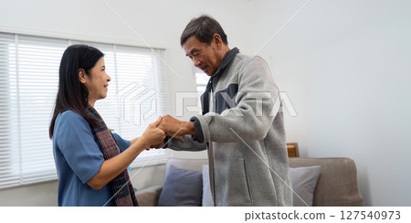 Holding hands, hug or happy old couple dancing for love, support or trust in marriage at home together 127540973