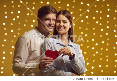Smiling Couple Celebrating Love on Valentine Day 127541306