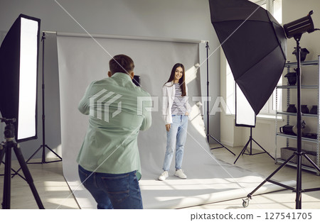 in studio with softboxes and professional photographic equipment in studio with softboxes and professional photographic equipment 127541705