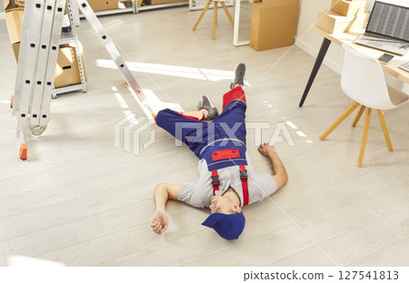 Worker Unconscious On Warehouse Floor Worker Unconscious On Warehouse Floor 127541813