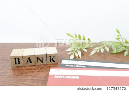 Image of a bank and a passbook. BANK building blocks and passbook components Image of a bank and a passbook. BANK building blocks and passbook components 127542270