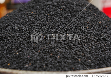Close-Up of Black Sesame Seeds in a Market Display Close-Up of Black Sesame Seeds in a Market Display 127542667