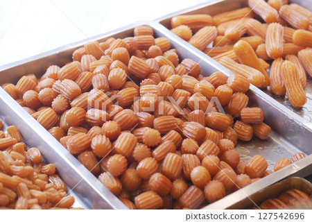 Traditional Turkish Desserts Tulumba selling at market  127542696
