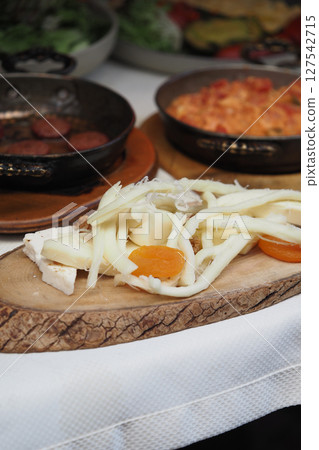 Delicious traditional dish prepared with fresh ingredients Delicious traditional dish prepared with fresh ingredients 127542715