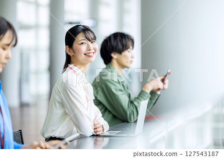 Business woman working at counter Business woman working at counter 127543187