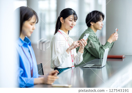 Business woman working at counter 127543191