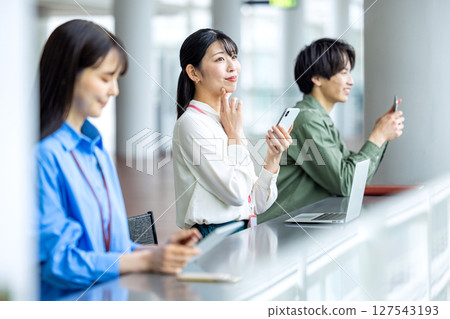 Business woman working at counter Business woman working at counter 127543193