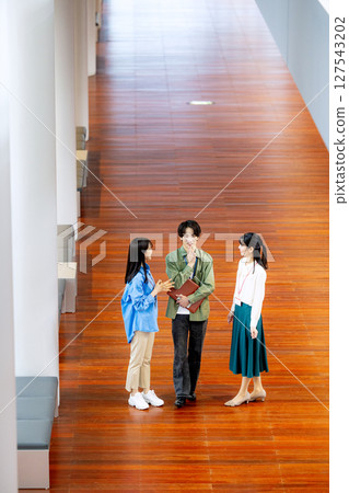Business scene walking down the corridor 127543202