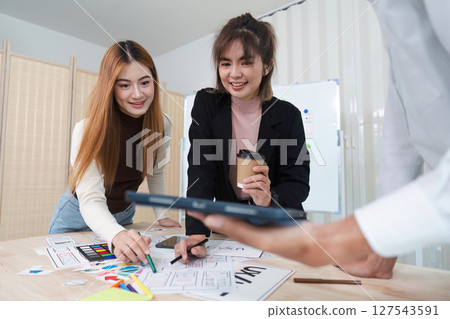 UI designer and UX developer brainstorm together. Creative digital development agency. UX UI concept UI designer and UX developer brainstorm together. Creative digital development agency. UX UI concept 127543591