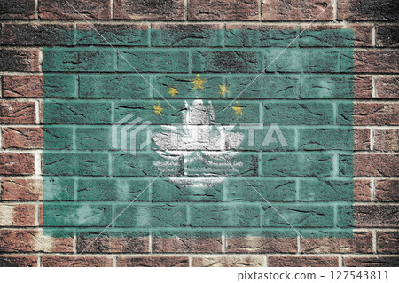 Macao flag on brick wall background Macao flag on brick wall background 127543811