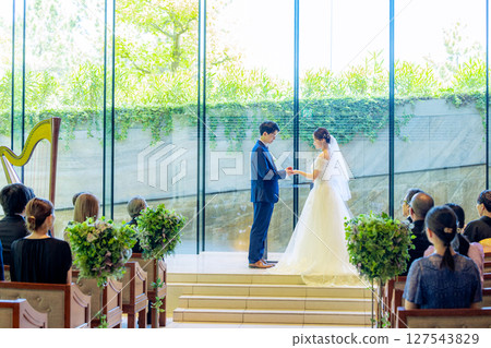 Wedding ring exchange 127543829