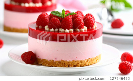 Delicious looking raspberry cake background 127546453