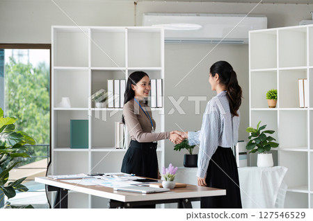 businesswoman shaking hands after meeting success. Handshake. Collaboration, teamwork 127546529