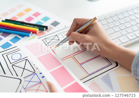 UI designer and UX developer brainstorm idea to design the application interface. Creative digital development agency. UX UI concept UI designer and UX developer brainstorm idea to design the application interface. Creative digital development agency. UX UI concept 127546715