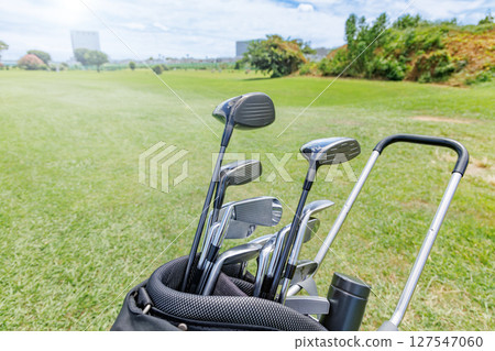 A golf course with beautiful fresh green grass A golf course with beautiful fresh green grass 127547060